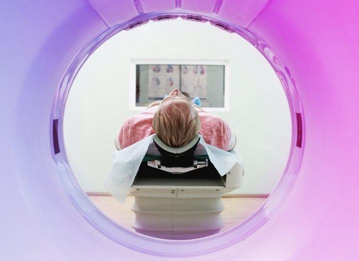 Image of a patient undergoing a CT scan in a clinic.