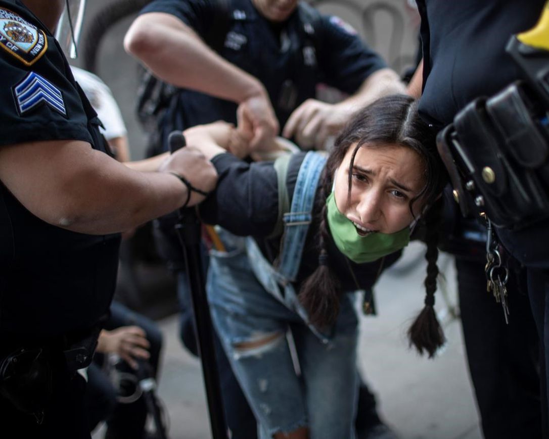 Police arrest a protester during a solidarity rally for George Floyd, Saturday, May 30, 2020, in New York. Protests were held throughout the city over the death of George Floyd, a black man who died after being restrained by Minneapolis police officers on May 25.