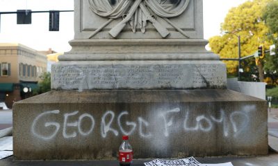In this Sunday, May 31, 2020 photo, protesters vandalize the downtown Athens Confederate War Memorial after the main protest ended in downtown Athens, Ga. The protest was organized to demonstrate against the death of George Floyd, who died in police custody in Minneapolis on May 25, sparking demonstrations and riots around the country.