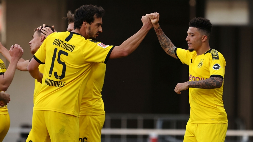 Sancho breaks English and Bundesliga records with Borussia Dortmund hat-trick