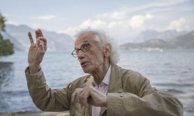 The artist Christo on the shore of Lake Iseo, where his work "The Floating Piers" would be installed, in the town of Sulzano, Italy, Sept. 19, 2015. He built a floating walkway, stretching nearly two miles, to connect two small islands. Christo, the Bulgarian-born conceptual artist who turned to epic-scale environmental works in the late 1960s, died on May 31 at his home in New York City. He was 84.