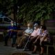 Elder people wearing face masks sit on a bench in a square in Barcelona, Spain, Sunday, May 31, 2020. Spanish Prime Minister Pedro Sánchez says he will ask Spain's Parliament for a final two-week extension of the nation's state of emergency that has allowed the government to take lockdown measures to control its coronavirus outbreak.