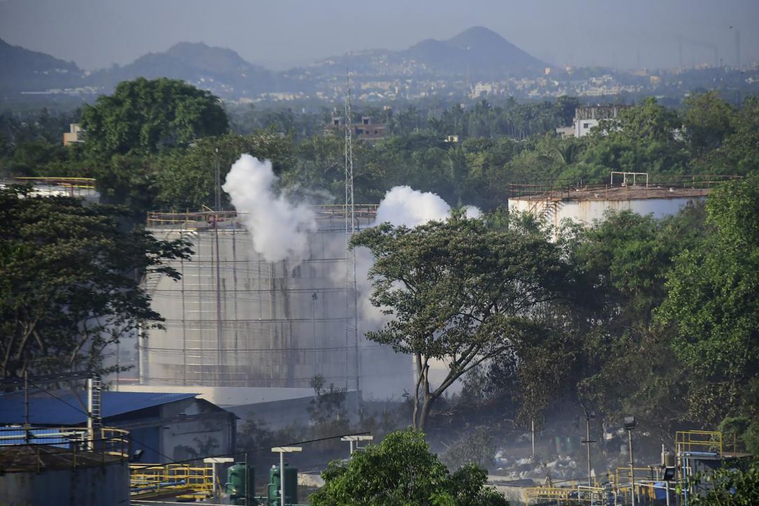 Smoke rises from LG Polymers plant, the site of a chemical gas leakage, on May 7 in Vishakhapatnam, India. A committee appointed by India’s top environmental court has blamed “gross human failure” and lack of basic safety norms for a gas leak in a South Korean-owned chemical factory this month that killed 12 people and sickened hundreds.