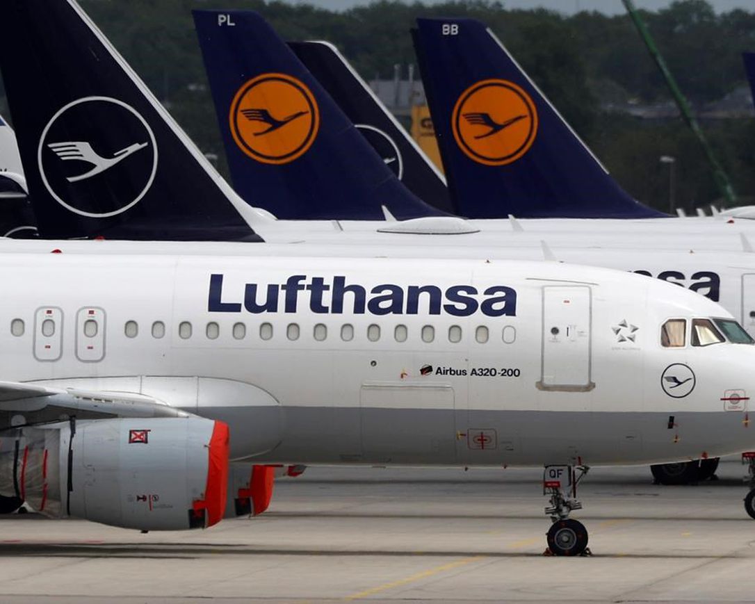 Aircrafts of the German airline Lufthansa are parked at the airport in Munich, Germany, Tuesday, May 26, 2020. Germany on Monday approved a 9 billion-euro ($9.8 billion) aid package for stricken airline Lufthansa to keep a major employer going through the turbulence of the coronavirus pandemic.