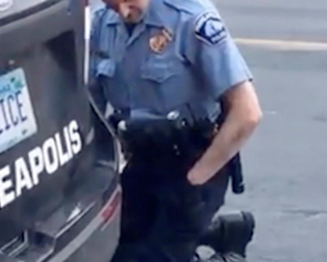 In this Monday, May 25, 2020, frame from video provided by Darnella Frazier, a Minneapolis officer kneels on the neck of a handcuffed man who was pleading that he could not breathe in Minneapolis. Four Minneapolis officers involved in the arrest of a George Floyd who died in police custody were fired Tuesday.
