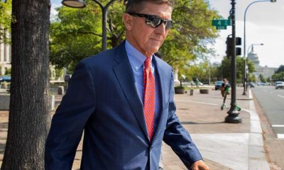 In this Sept. 10, 2019 file photo, Michael Flynn, President Donald Trump's former national security adviser, leaves the federal court following a status conference in Washington. FBI Director Christopher Wray has ordered an internal review into possible misconduct in the investigation of former Trump administration national security adviser Michael Flynn. That's according to an FBI statement issued Friday.