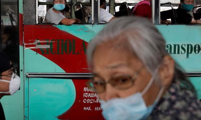 People ride a bus during the first day of a more relaxed lockdown that was placed to prevent the spread of the new coronavirus in Manila, Philippines on Monday, June 1, 2020. Traffic jams and crowds of commuters are back in the Philippine capital, which shifted to a more relaxed quarantine with limited public transport in a high-stakes gamble to slowly reopen the economy while fighting the coronavirus outbreak.