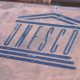 UNESCO logo stenciled on to a steel surface.