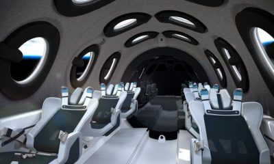 Render image of the 12 seats and circular halo windows on the Virgin Galactic spacecraft.